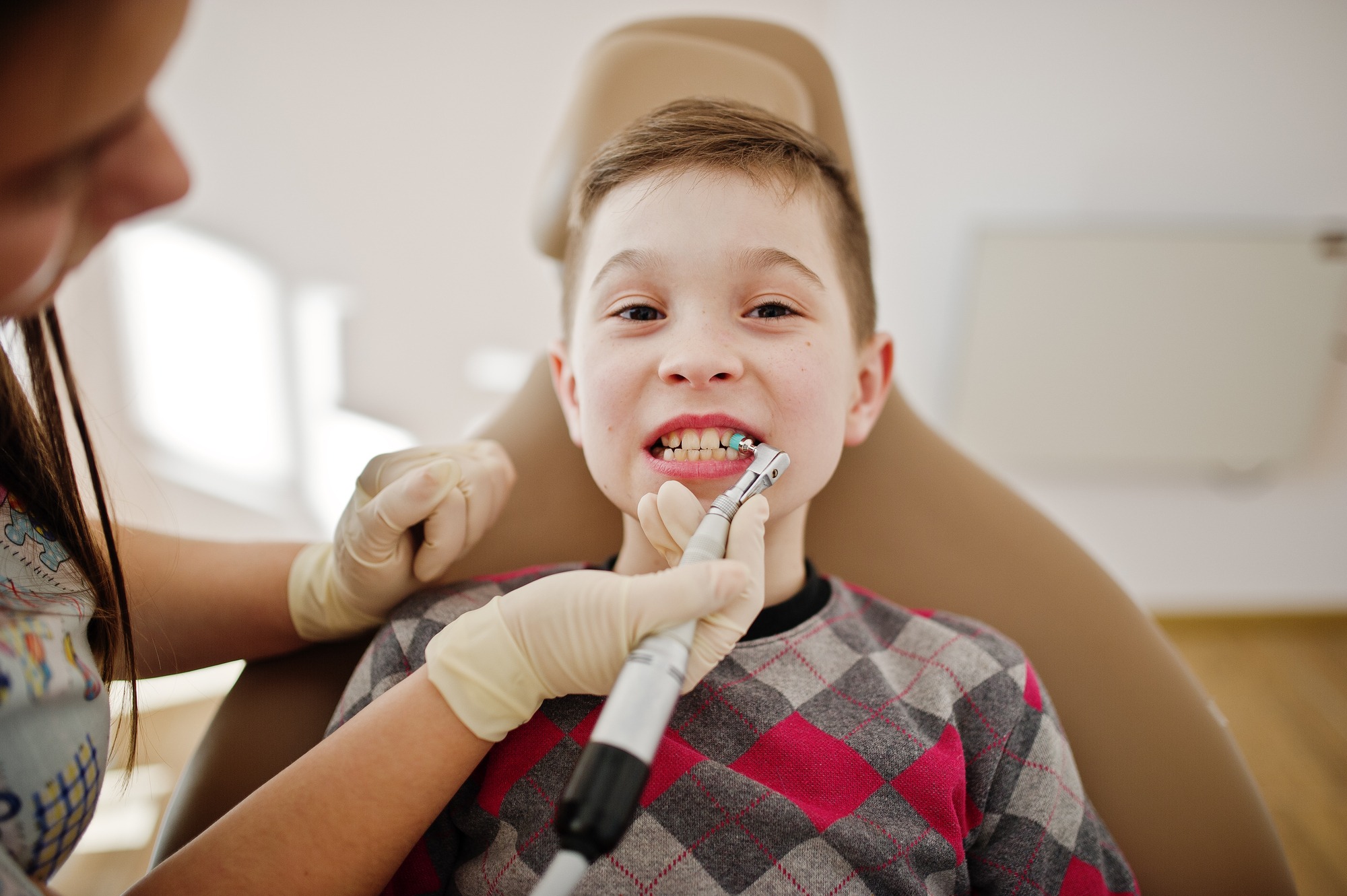 Little boy at dentist chair. Children dental